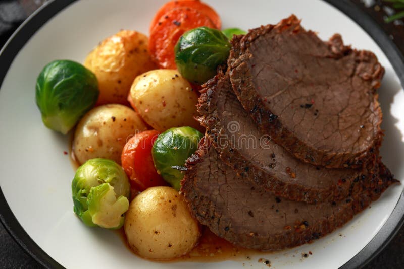 Sliced Roast Beef with Honey Glazed Vegetables, Served on Plate