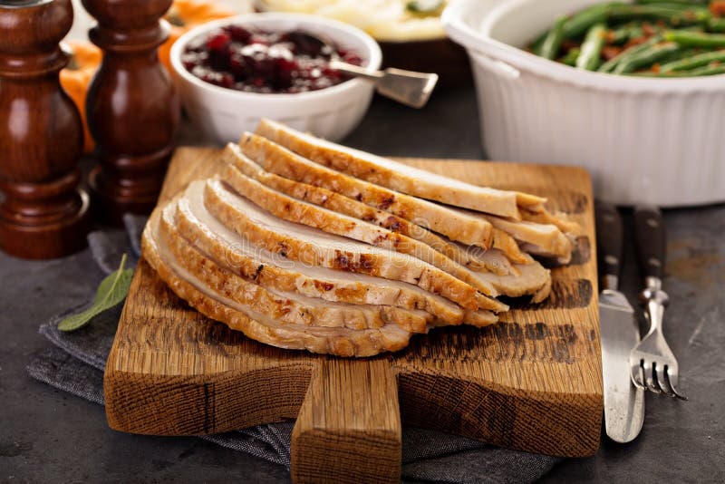 Sliced roasted turkey breast for Thanksgiving or Christmas stock images Sliced roasted turkey breast for Thanksgiving or Christmas stock images