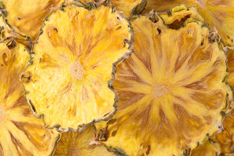 Sliced Round Pieces of Dried Pineapple, Closeup, Background Stock
