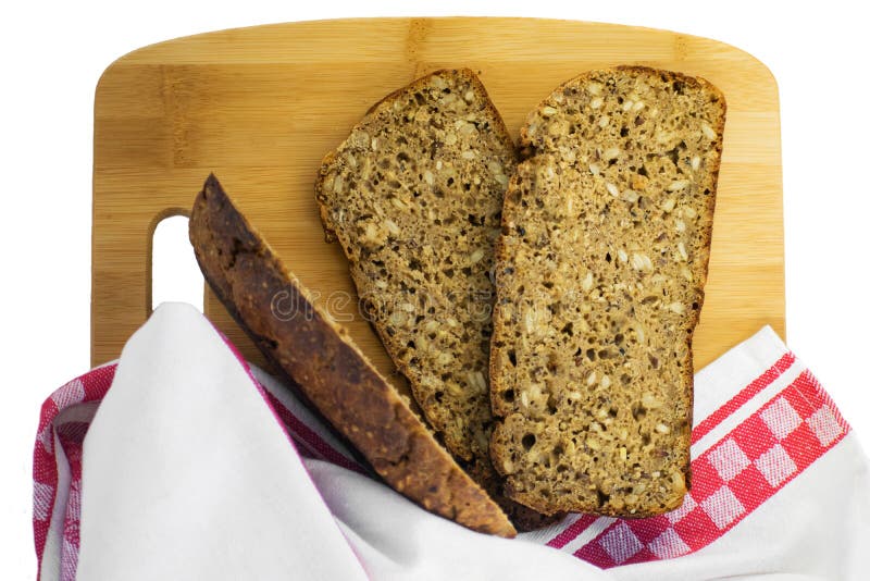 Sliced Rye Bread on Cutting Board. Whole Grain Rye Bread with Seeds