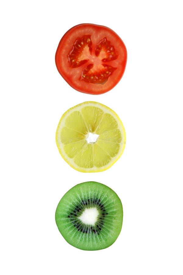 Sliced tomato lemon kiwi royalty free stock photos