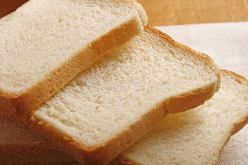 Sliced white bread. Fresh white sandwich bread on table stock images