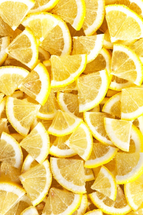 Slices of fresh lemon in sugar. Background and texture. stock photo