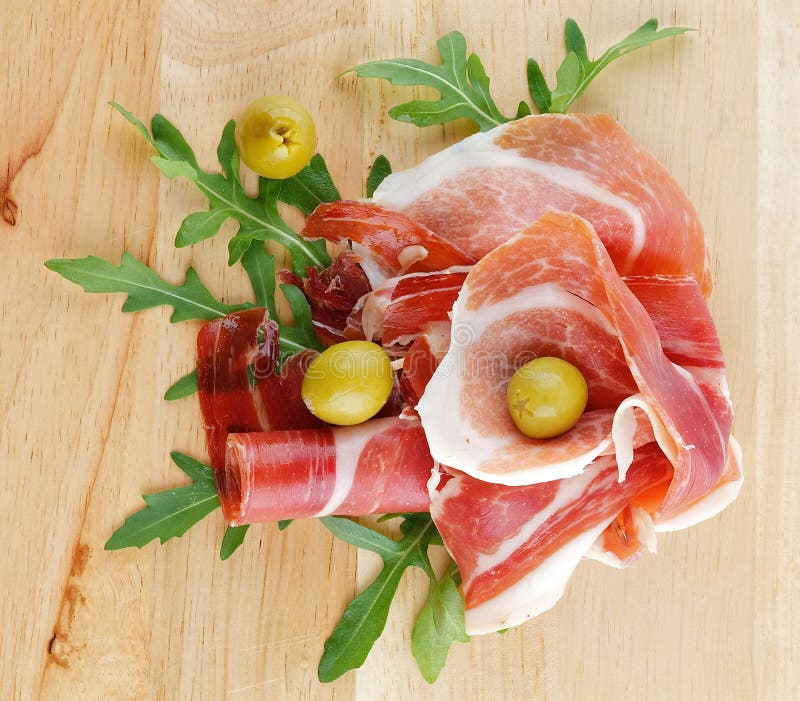 Slices of jamon and olives