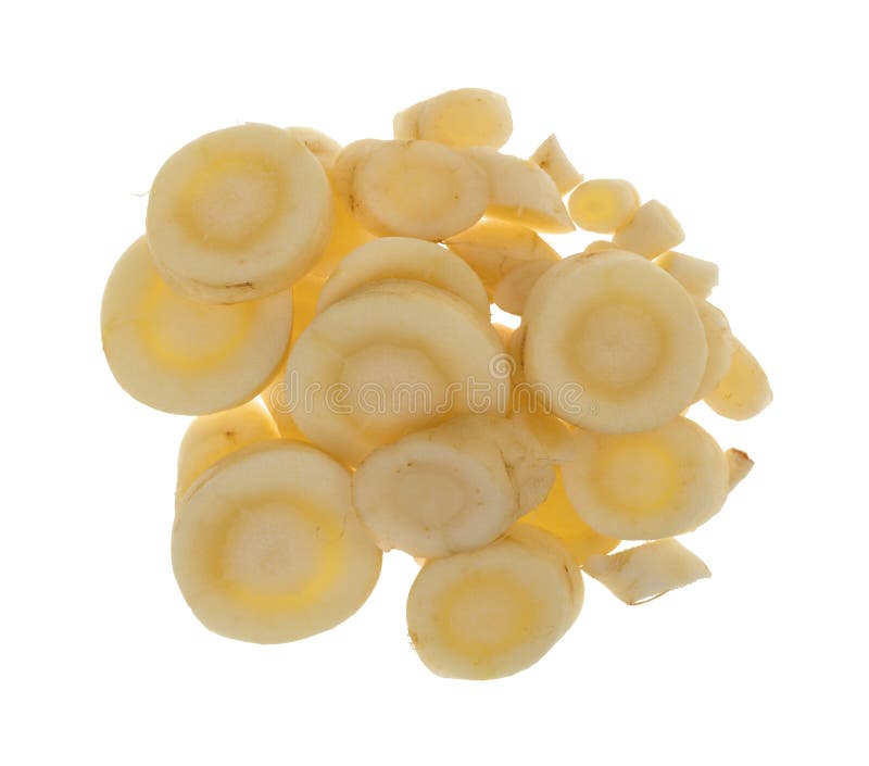Slices of parsnip on a white background royalty free stock photography