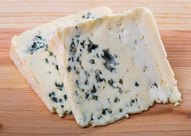 Slices of Soft Blue Cheese with Mold at Plate, Nobody Stock Image