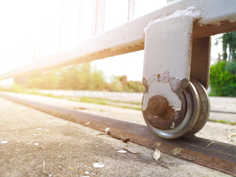 Sliding Door Wheels Installed on the Metal Front Rail Stock Image