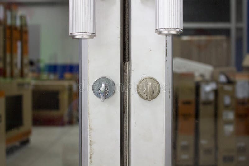 Sliding Doors Locked with a Knob.,Locked Door with a Knob. Stock Image