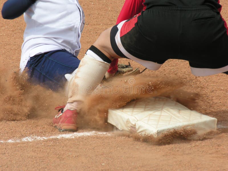 Softball player sliding stock image. Image of baseball 1470043