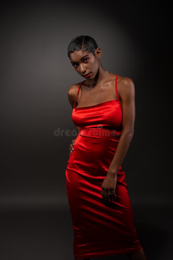 Slim black woman in red stoc