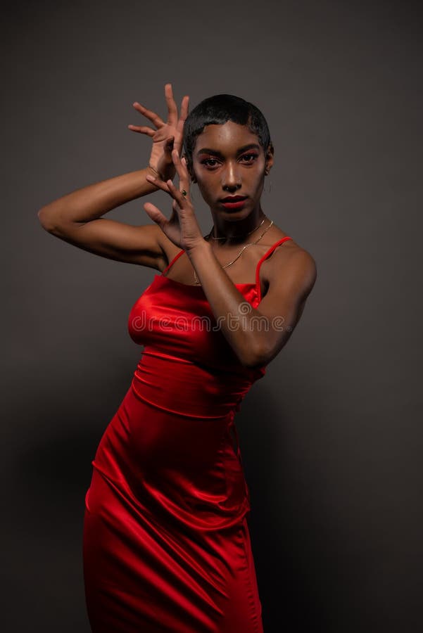 Slim black woman in red stoc pic