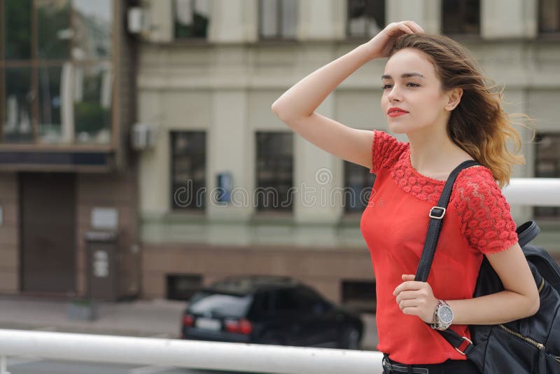 Slim Girl Walking Down the Street of the City Upwind Stock Image ...