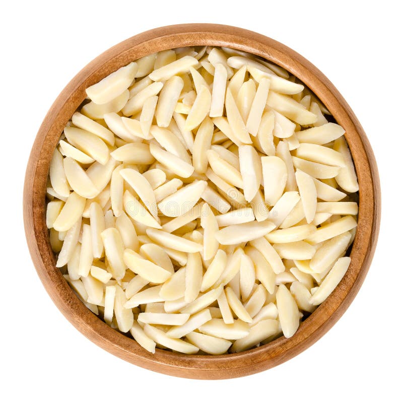 Slivered blanched almonds in wooden bowl over white