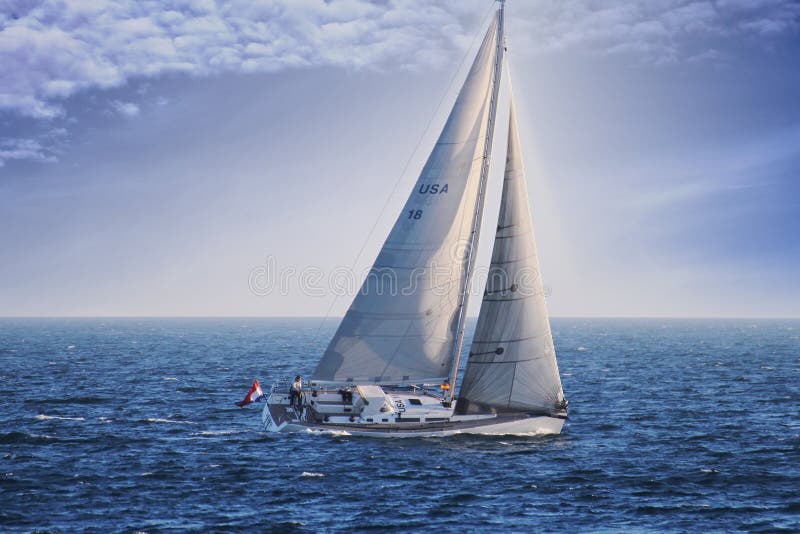 Sloop of Kraker Trailers Company sailing in the open waters of the Mediterranean Sea. Sloop of Kraker Trailers Company sailing in the open waters of the Mediterranean Sea.