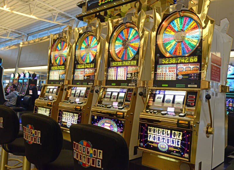 Las Vegas, NV, USA - 13th July 2013: People Playing Slot Machine Games  Inside Las Vegas Casino. Stock Photo, Picture and Royalty Free Image. Image  26254649.