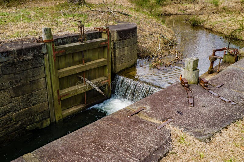 Blue Ridge Parkway, VA – March 2nd: James River locks were part of the James River and Kanawha Canal used to raise and lower bateaus when the James River was the main commerce route to coast in the 19th century, Blue Ridge Parkway, VA on the 2nd of March 2018. Blue Ridge Parkway, VA – March 2nd: James River locks were part of the James River and Kanawha Canal used to raise and lower bateaus when the James River was the main commerce route to coast in the 19th century, Blue Ridge Parkway, VA on the 2nd of March 2018.