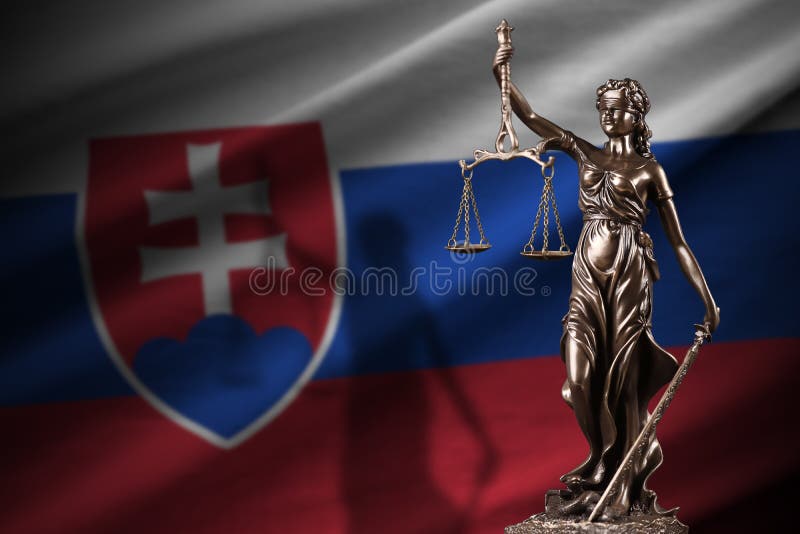 Slovakia flag with statue of lady justice and judicial scales in dark room. Concept of judgement and punishment