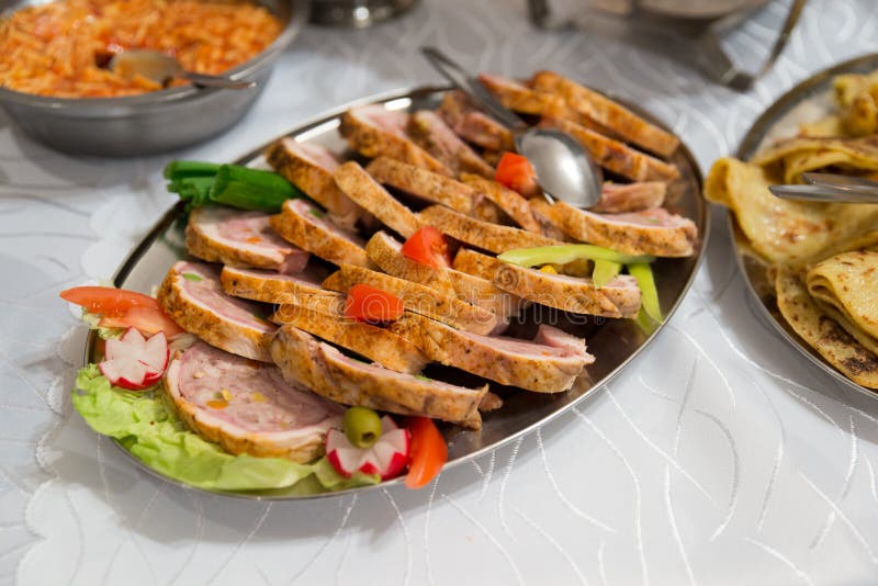 Slovakian food pork meat on buffet table.