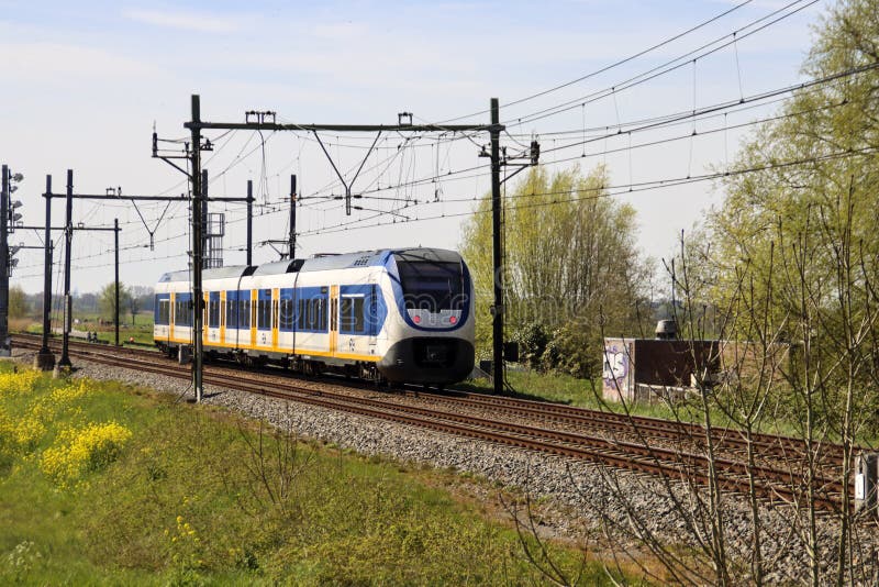 SLT Sprinter Train of NS on Track in Driebruggen Editorial Photo