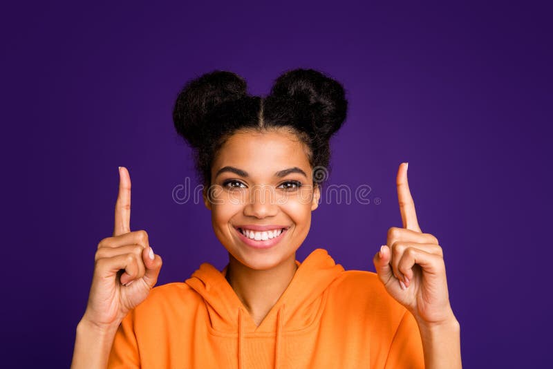 Close up photo of casual cute nice pretty charming woman pointing up smiling, toothily demonstrating you new information  vibrant color background. Close up photo of casual cute nice pretty charming woman pointing up smiling, toothily demonstrating you new information  vibrant color background
