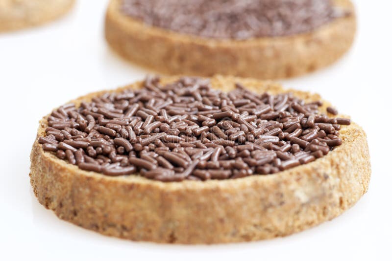 Sluit omhoog chocolade bestrooit op toost. royalty-vrije stock foto's Sluit omhoog chocolade bestrooit op toost. royalty-vrije stock foto's