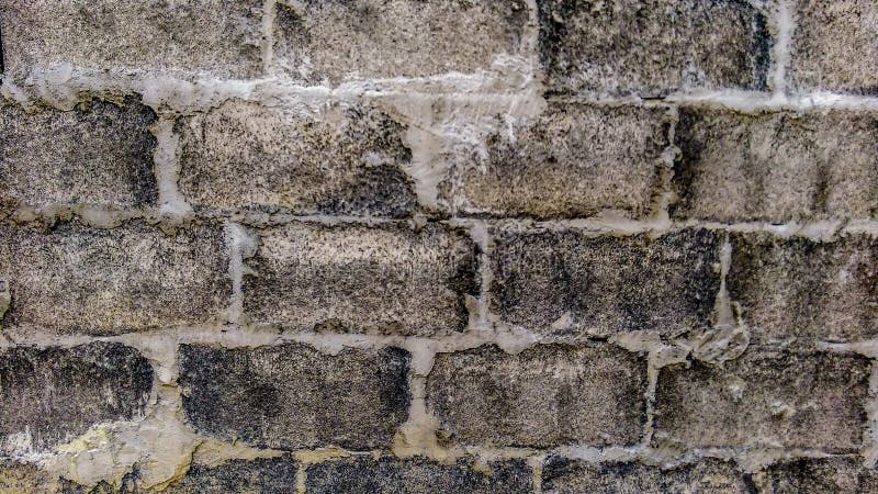 Sluit omhoog van muur van uitstekende bakstenen wordt gemaakt die royalty-vrije stock fotografie Sluit omhoog van muur van uitstekende bakstenen wordt gemaakt die royalty-vrije stock fotografie