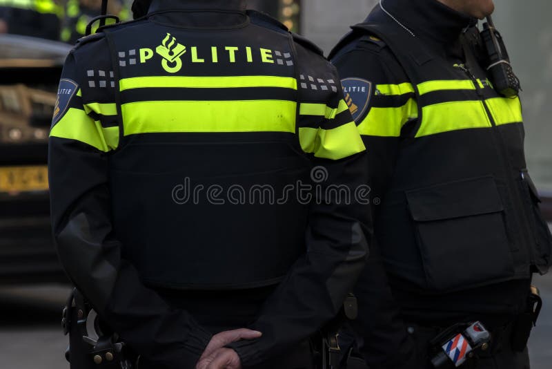 Close Up Two Police Men At Amsterdam The Netherlands 4-5-2020. Close Up Two Police Men At Amsterdam The Netherlands 4-5-2020.
