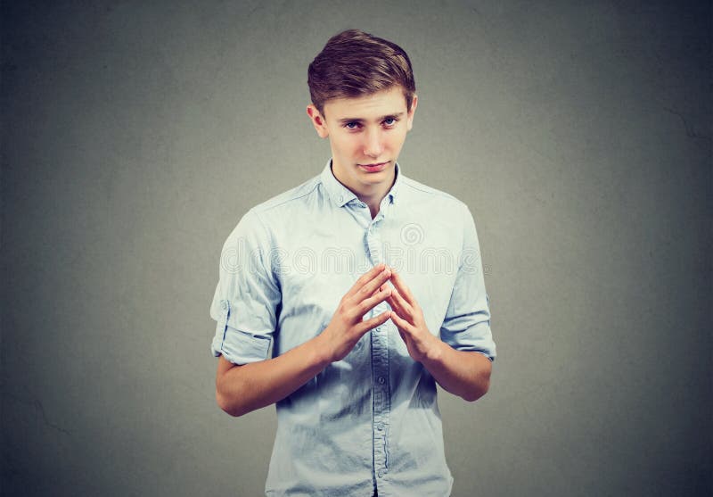 Sly, Scheming Man Plotting Something To Someone Stock Photo Image of