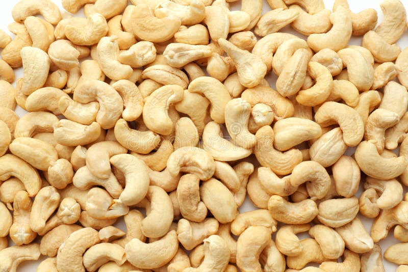 Smakelijke cashewnoten als achtergrond royalty-vrije stock fotografie Smakelijke cashewnoten als achtergrond royalty-vrije stock fotografie