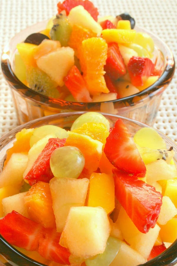 Enjoying tasty fruit salad in summertime. Enjoying tasty fruit salad in summertime