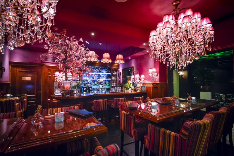 An ornately decorated and colorful bar inside a luxury hotel in the historic center of Amsterdam, Netherlands stock photo An ornately decorated and colorful bar inside a luxury hotel in the historic center of Amsterdam, Netherlands stock photo