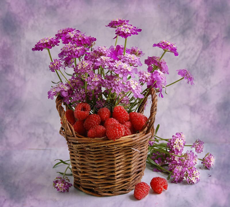 Small basket with a raspberry and colors