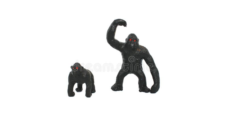 Small black gorilla and gorilla cub figurine in white background