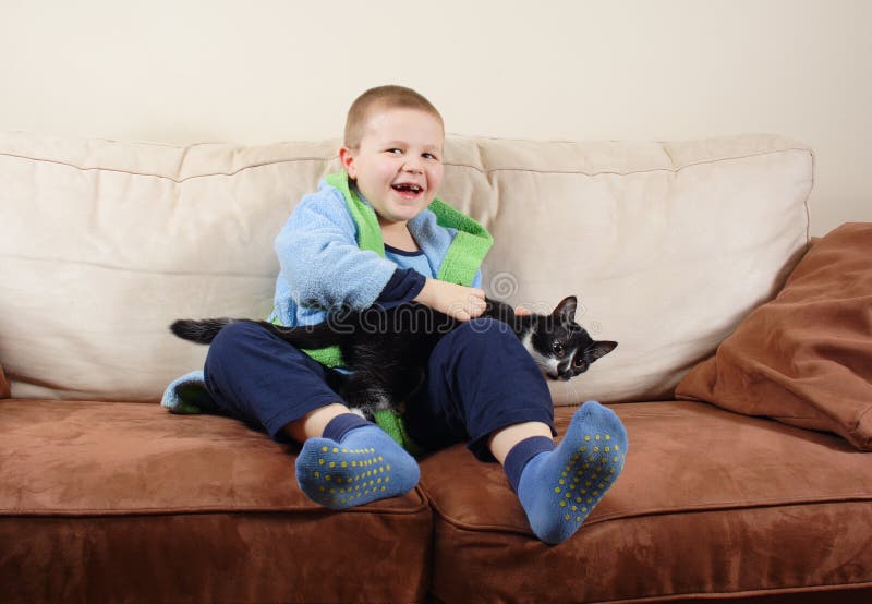 Small boy with cat