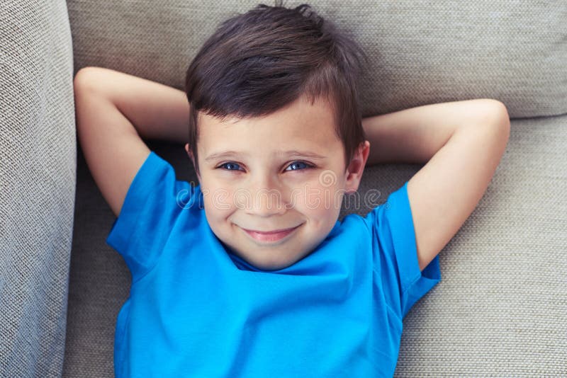 Small Boy Holding Hands Behind Head Lying Sofa Stock Photos Free