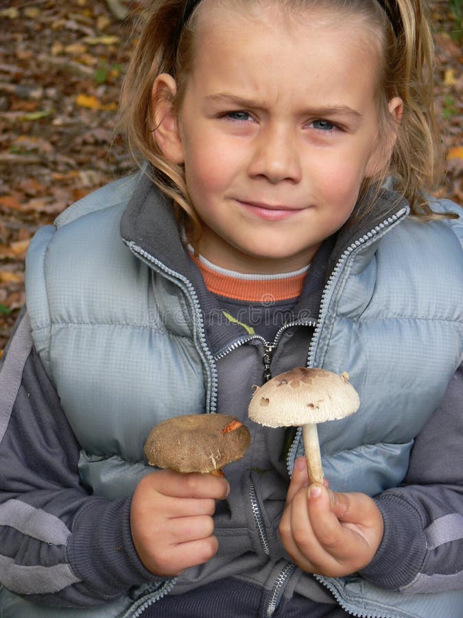 Small boy with mushrooms