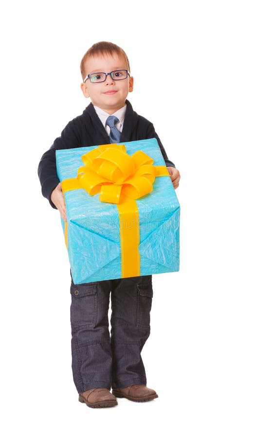 Small boy in spectacles with big present stock photos Small boy in spectacles with big present stock photos
