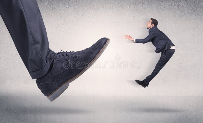 Businessman Being Kicked Out By His Employer Free Image and Photograph  26196001.