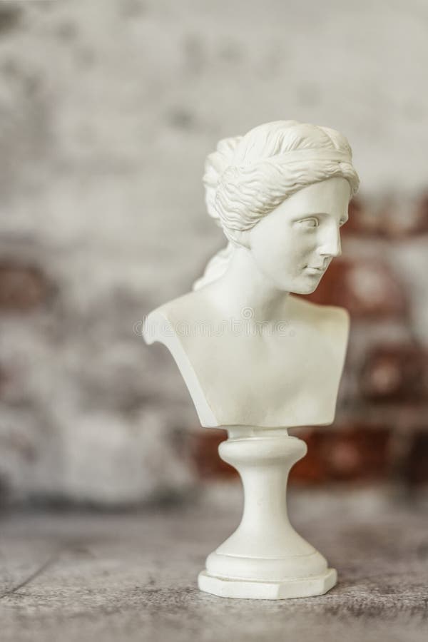 Small Bust of Classical Greek Figure on Gray Background with Ha Stock Image Image of decorate