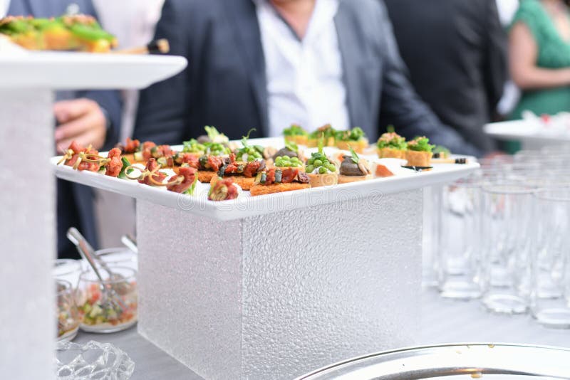 Small Canapes Appetizers at the Wedding the Catering Stock Photo