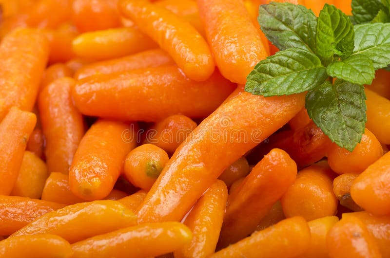 Small carrots cooked royalty free stock images
