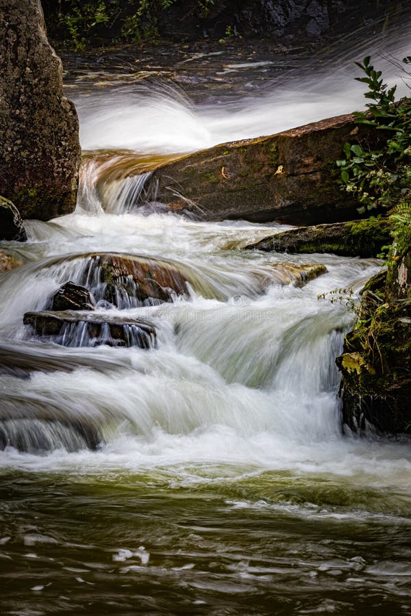 Small Cascades Flow at the Bottom of Glen Cannon Falls in North