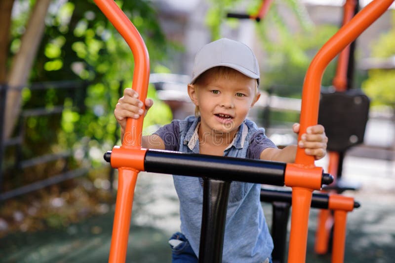 Boy on the playground royalty free stock photography