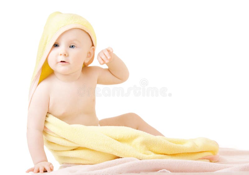 Small child with yellow towel