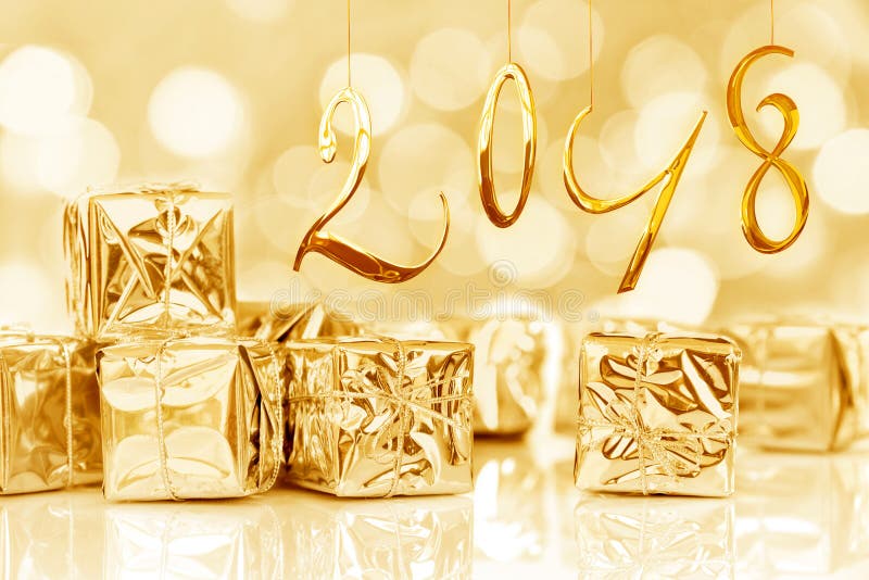 2018, small Christmas gifts in shiny golden paper, bokeh lights background stock images 2018, small Christmas gifts in shiny golden paper, bokeh lights background stock images