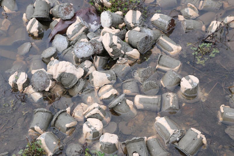 Small Concrete Cylinders in Water, in Paint and in Mounting Foam Stock