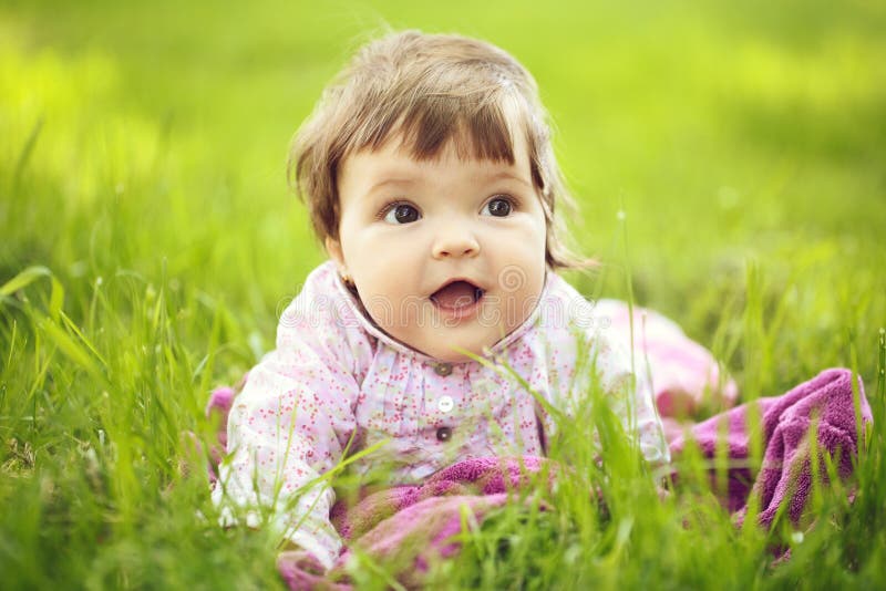 Cute Baby Girl on Green Grass Stock Photo - Image of lawn, small: 135719098 Cute Baby Girl on Green Grass Stock Photo - Image of lawn, small: 135719098