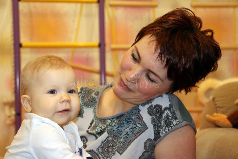 Small cute baby and mom stock photo. Image of curiosity 73071800