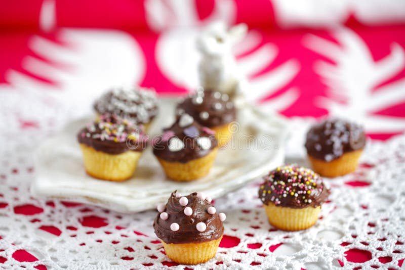 Small muffins with chocolate and sprinkles