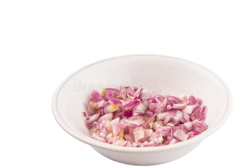 Small dice style of chopped onions in a bowl over white background. Small dice style of chopped onions in a bowl over white background
